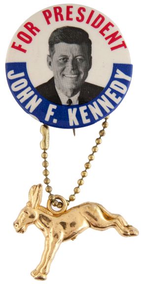 “FOR PRESIDENT JOHN F. KENNEDY” BUTTON WITH GOLD LUSTER FIGURAL PLASTIC DONKEY ATTACHED.