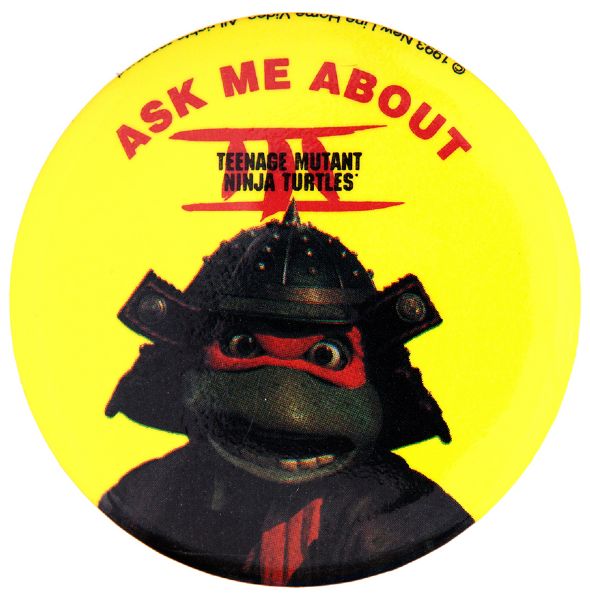 “ASK ME ABOUT TEENAGE MUTANT NINJA TURTLES III” 1993 LIMITED ISSUE VIDEO PROMO BUTTON.
