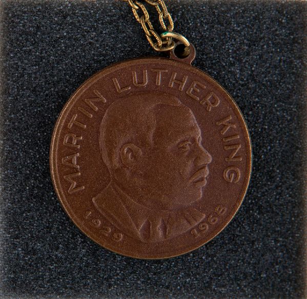 MARTIN LUTHER KING AND PEACE NOW MEDALLION ON CHAIN BOXED CIRCA 1968.