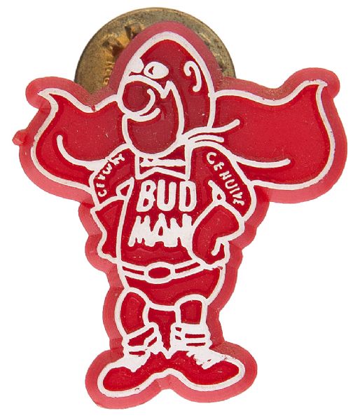 “BUD MAN” FIGURAL PLASTIC WITH NEEDLE POST & CLUTCH BACK BUTTON.