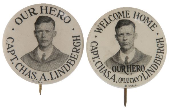 “CAPT. CHAS. A. LINDBERGH – OUR HERO / WELCOME HOME” SCARCE VERSIONS 1927 DESIGN BUTTON PAIR.