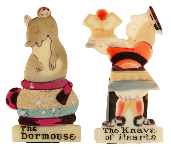 TWO RARE FIGURAL PENCIL SHARPENERS FROM ALICE IN WONDERLAND.