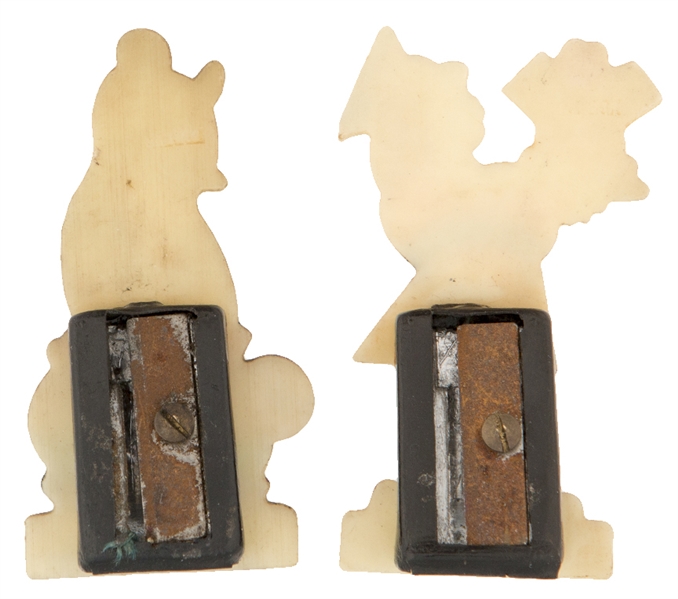 TWO RARE FIGURAL PENCIL SHARPENERS FROM ALICE IN WONDERLAND.